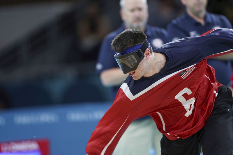 Sweat drops from Calahan Young, U.S. goalball team captain, as he throws the ball during a match against Brazil on Friday, August 30, 2024 at the South Paris Arena during the Paralympic Games in Paris. (Photo/ Nathalee Simoneau)