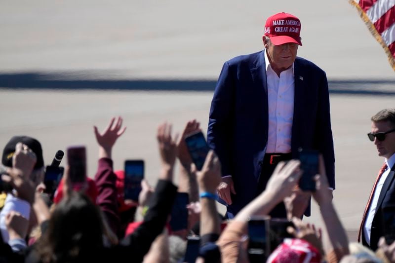 Republican presidential nominee former President Donald Trump arrives to speak during a campaign event at Central Wisconsin Airport, Saturday, Sept. 7, 2024, in Mosinee, Wis. (AP Photo/Morry Gash)