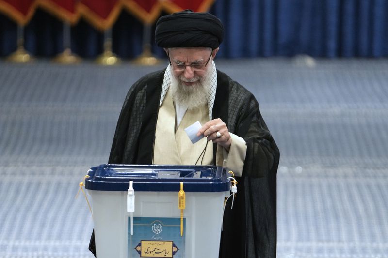 Iranian Supreme Leader Ayatollah Ali Khamenei casts his ballot during the presidential election, in Tehran, Iran, Friday, June 28, 2024. Iranians were voting Friday in a snap election to replace the late President Ebrahim Raisi, killed in a helicopter crash last month, as public apathy has become pervasive in the Islamic Republic after years of economic woes, mass protests and tensions in the Middle East. (AP Photo/Vahid Salemi)