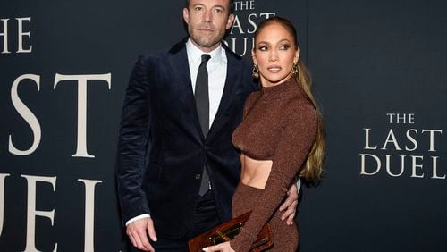 FILE - Actor Ben Affleck, left, and actor-singer Jennifer Lopez attend the premiere of "The Last Duel" on Oct. 9, 2021, in New York. (Photo by Evan Agostini/Invision/AP, File)