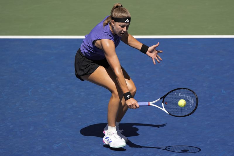 Karolina Muchova, of the Czech Republic, returns a shot during a match against Jasmine Paolini, of Italy, in the fourth round of the U.S. Open tennis championships, Monday, Sept. 2, 2024, in New York. (AP Photo/Eduardo Munoz Alvarez)