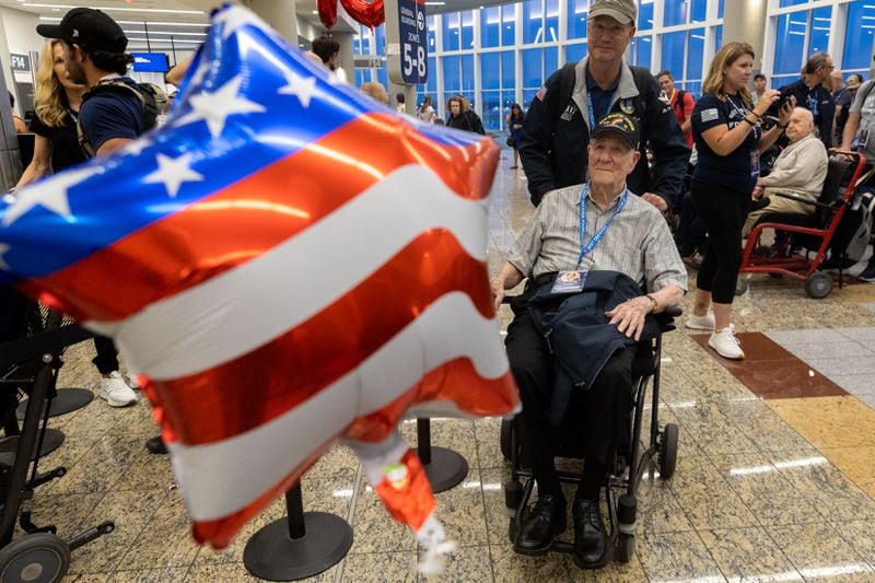 World War II veteran Hilbert Margol of Dunwoody gets ready to board a Delta charter flight to Normandy at the Hartsfield-Jackson international terminal in Atlanta on Sunday, June 2, 2024. Delta and Best Defense Foundation flew more than 40 WWII veterans to Normandy to commemorate the 80th anniversary of D-Day. (Arvin Temkar / AJC)