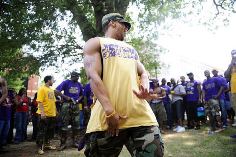 Robert Watkins, 24, from Georgia Southern, dances for his fraternity Omega Psi Phi and others.