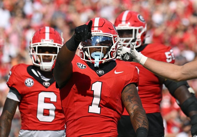 Georgia running back Trevor Etienne (1) celebrates after scoring a touchdown during the first half in an NCAA football game at Sanford Stadium, Saturday, October 5, 2024, in Athens. (Hyosub Shin / AJC)