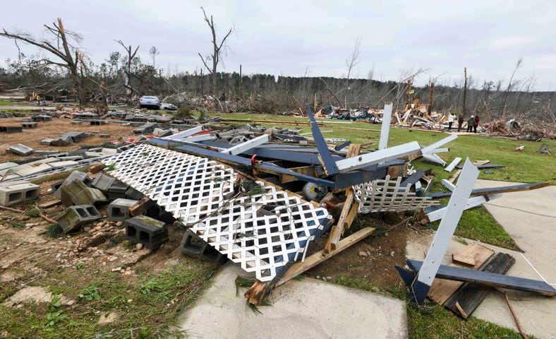 Photos: Tornadoes leave path of death, destruction in parts of Southeast