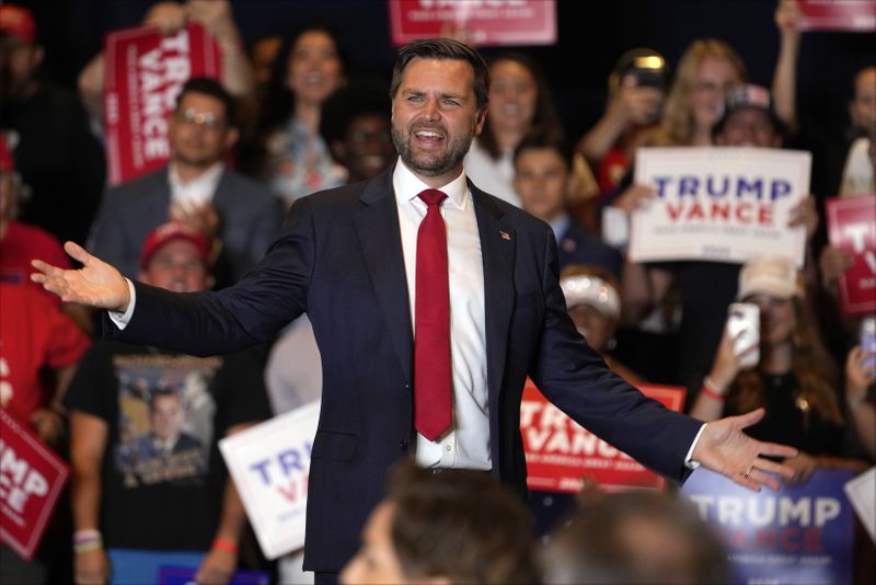 Republican vice presidential nominee Sen. JD Vance, R-Ohio, gestures to supporters at a campaign event, Thursday, Sept. 5, 2024, in Phoenix. (AP Photo/Matt York)