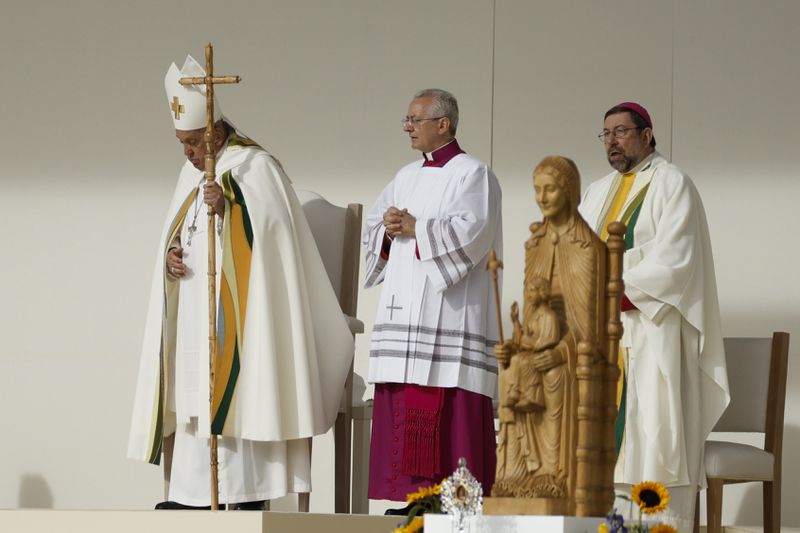 Pope Francis leaves at the end of the Sunday mass at King Baudouin Stadium, in Brussels Sunday, Sept. 29, 2024. (AP Photo/Omar Havana)