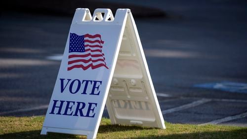 A “Vote Here” sign outside a Cobb County polling location on Monday, May 2, 2022. (Natrice Miller / natrice.miller@ajc.com)