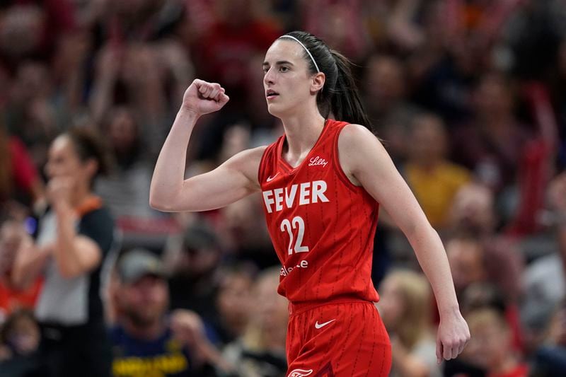 Indiana Fever guard Caitlin Clark reacts during the first half of a WNBA basketball game against the Phoenix Mercury, Friday, Aug. 16, 2024, in Indianapolis. (AP Photo/Darron Cummings)