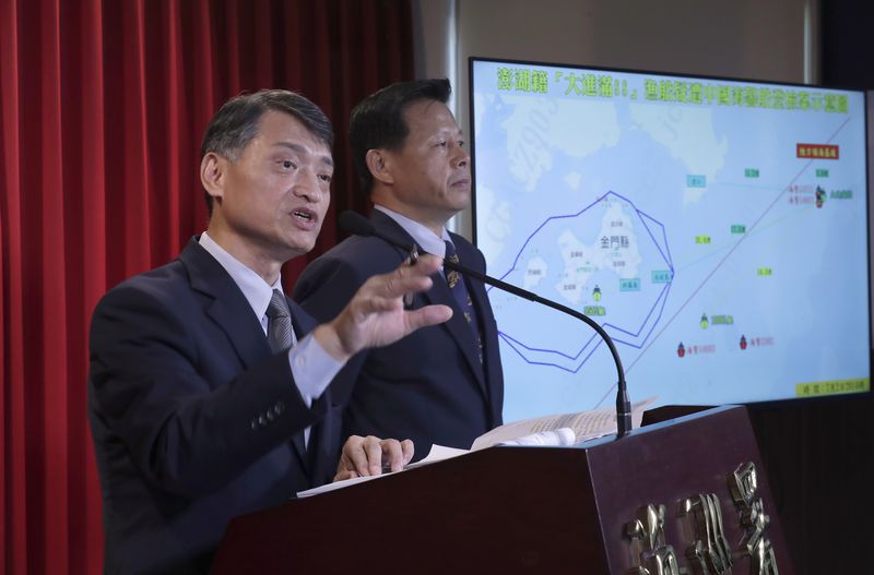 Coastal Control Division Chief Liao Yun-Hung, left, with Deputy Director General Hsieh Ching-Chin, answers a question about a fishing boat that Taiwan said China detained Tuesday night, during a news conference in Taipei, Taiwan, Wednesday, July 3, 2024. Taiwan is calling for the release of a fishing boat after it was boarded by China''s coast guard and steered to a port in mainland China on Tuesday. (AP Photo/Chiang Ying-ying)
