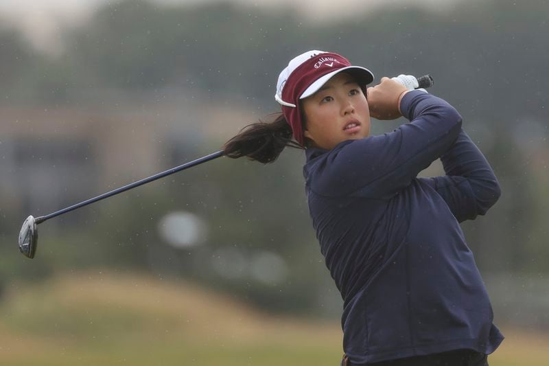 Ruoning Yin, of China, play off the 3rd tee during the final round of the Women's British Open golf championship, in St. Andrews, Scotland, Sunday, Aug. 25, 2024. (AP Photo/Scott Heppell)