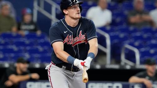 Atlanta Braves Sean Murphy (12) hits a double to center field during the first inning of a baseball game against the Miami Marlins, Thursday, May 4, 2023, in Miami. (AP Photo/Marta Lavandier)