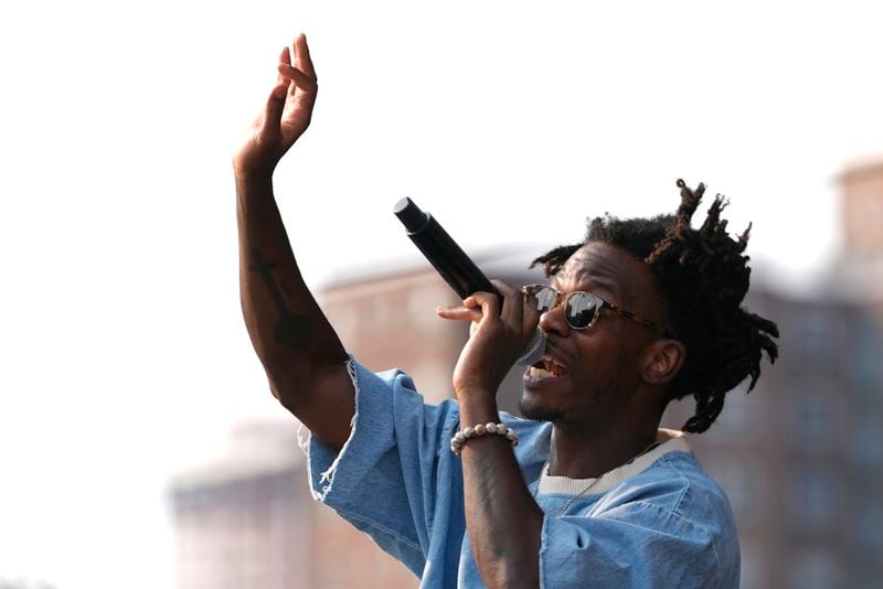 JSWISS performs in the Harlem neighborhood of New York, Thursday, Aug. 15, 2024. (AP Photo/Pamela Smith)