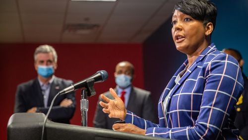 After the approval vote of the Public Safety Training Center this week, Mayor Mayor Keisha Lance Bottoms, Atlanta Police Chief Rodney Bryant, Chief Rod Smith of the Atlanta Fire Rescue Department and Dave Wilkinson of the Atlanta Police Foundation address questions about the facility, it's location and the concerns of the community Thursday, Sept 9, 2021.  (Jenni Girtman for The Atlanta Journal-Constitution)