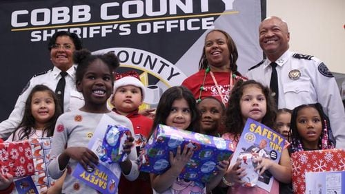 Sheriff Craig Owens gave out Christmas gifts to the kindergarten classes of Bryant Elementary School on Thursday. (Photo Courtesy of Joe Adgie)