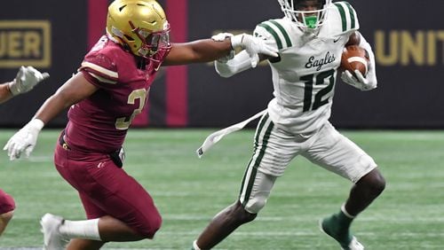 August 21, 2021 Atlanta - Collins HillÕs Travis Hunter (12) runs with the ball during the 2021 Corky Kell Classic on Saturday, August 21, 2021. (Hyosub Shin / Hyosub.Shin@ajc.com)