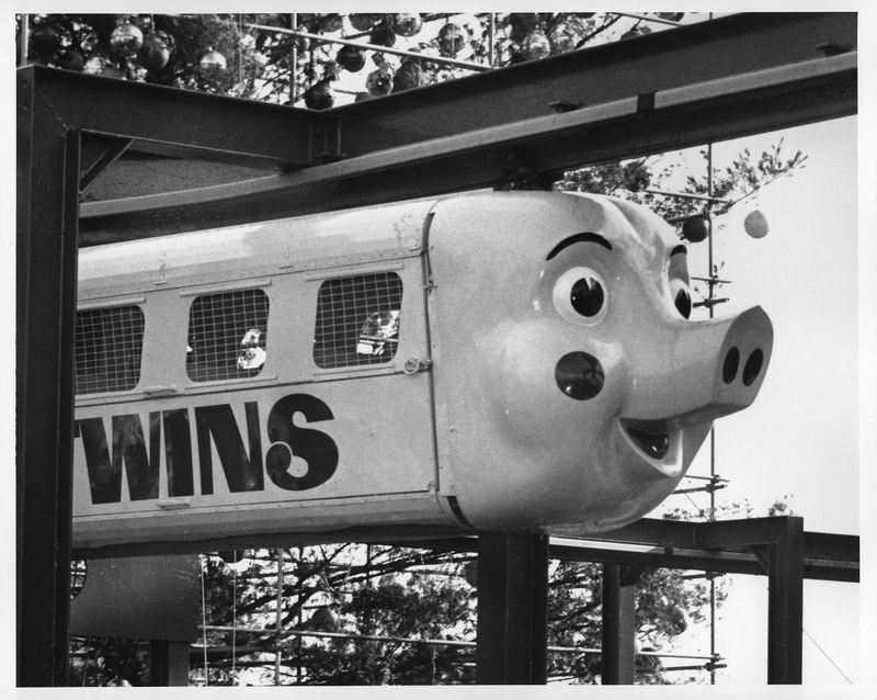 In his glory days, Percival the Pink Pig and partner Priscilla transported Christmas shoppers around the roof of Rich's.