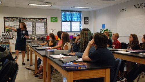 Shari Tolan leads a high-school level class on physical science at Teasley Middle School in Canton.