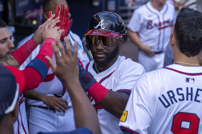 Atlanta Braves' Michael Harris II celebrates during the 10th inning of a baseball game against the Toronto Blue Jays, Sunday, Sept. 8, 2024, in Atlanta. (AP Photo/Erik Rank)