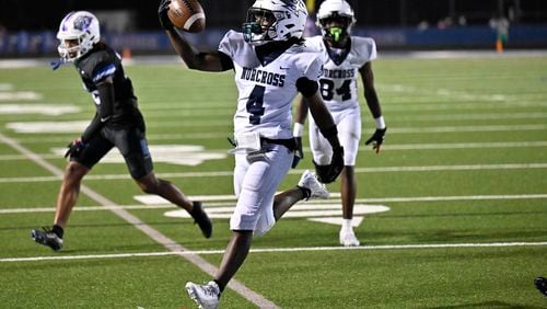 Norcross wide receiver Jahsaun Clarke (4) runs for the winning touchdown during the Norcross at Peachtree Ridge GHSA region football game on Friday, Sept. 20, 2024, in Suwanee, GA. (Jim Blackburn for the AJC)1