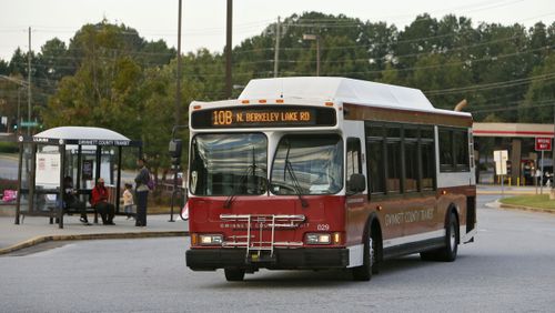 In this 2013 file photo, a Gwinnett County Transit bus s pulls away from the transit center in Duluth. BOB ANDRES / BANDRES@AJC.COM