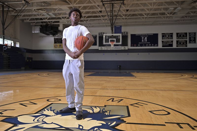 Flerentin “Flex” Jean-Baptiste, 16, of Medford, Mass., poses for a photo at Medford High School, Friday, Aug. 2, 2024, in Medford. (AP Photo/Josh Reynolds)