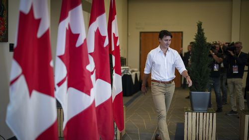 Canada Prime Minister Justin Trudeau arrives to speak to reporters at the Liberal Caucus retreat in Nanaimo, British Columbia, Wednesday, Sept. 11, 2024. (Darryl Dyck/The Canadian Press via AP)