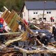 Rescuers search for missing people after floods and landslides in the village of Donja Jablanica, Bosnia, Saturday, Oct. 5, 2024. (AP Photo/Armin Durgut)