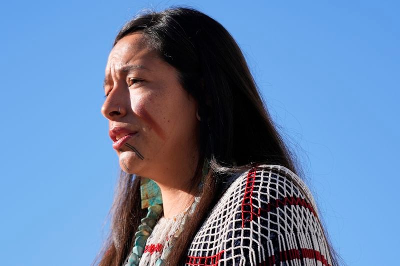 Ka-Voka Jackson, director of cultural resources for the Hualalai Tribe, speaks during a news conference in front of U.S. District Court as she joins other members of the Hualapai Tribe gathered to try to persuade a federal judge to extend a temporary ban on exploratory drilling for a lithium project, Tuesday, Sept. 17, 2024, in Phoenix. (AP Photo/Ross D. Franklin)