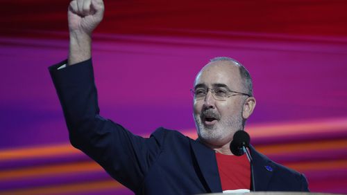 Shawn Fain, president of the United Automobile Workers, speaks during the Democratic National Convention Monday, Aug. 19, 2024, in Chicago. (AP Photo/Paul Sancya)