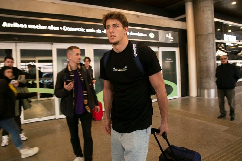 French rugby player Oscar Jegou arrives from Mendoza to the airport in Buenos Aires, Argentina, Tuesday, Aug. 27, 2024. He and teammate Hugo Auradou were arrested following charges of sexual assault after France played Argentina in Mendoza on July 6. (AP Photo/Virginia Chaile)