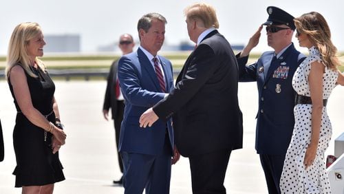 April 24, 2019 Atlanta - Atlanta - President Donald Trump and First Lady Melania Trump are greeted by Governor Brian Kemp with Georgia First Lady Marty Kemp at Hartsfield-Jackson Airport on Wednesday, April 24, 2019. President Donald Trump and first lady Melania Trump addressed the Rx Drug Abuse and Heroin Summit at the Hyatt Regency Hotel in downtown Atlanta on Wednesday afternoon. HYOSUB SHIN / HSHIN@AJC.COM