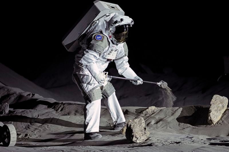 Astronauts demonstrate their training in lunar surface simulating conditions for future moon missions, like the Artemis lunar exploration program led by NASA, at the opening of the new LUNA facility at the European Astronaut Center in Cologne, Germany, Wednesday, Sept. 25, 2024. (AP Photo/Martin Meissner)