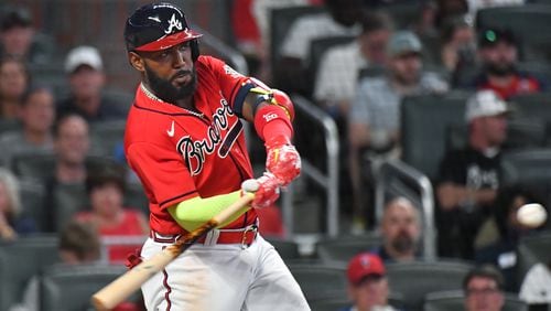 May 21, 2021 Atlanta - Atlanta Braves left fielder Marcell Ozuna (20) hits one run home run in the 6th inning at Truist Park on Friday, May 21, 2021. Atlanta Braves won 20-1 over Pittsburgh Pirates. (Hyosub Shin / Hyosub.Shin@ajc.com)