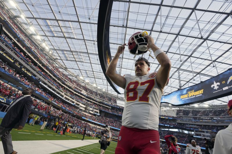 Kansas City Chiefs tight end Travis Kelce celebrates following an NFL football game against the Los Angeles Chargers Sunday, Sept. 29, 2024, in Inglewood, Calif. The Chiefs won 17-10. (AP Photo/Marcio Jose Sanchez)