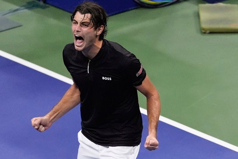 Taylor Fritz, of the United States, reacts after defeating Frances Tiafoe, of the United States, during the men's singles semifinal of the U.S. Open tennis championships, Friday, Sept. 6, 2024, in New York. (AP Photo/Julia Nikhinson)