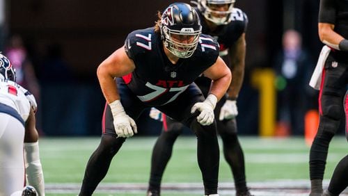 Atlanta Falcons offensive tackle Storm Norton (77) lines up during the second half of an NFL football game against the Houston Texans, Sunday, Oct. 8, 2023, in Atlanta. The Atlanta Falcons won 21-19. (AP Photo/Danny Karnik)