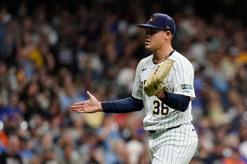 Milwaukee Brewers' Tobias Myers claps as he walks to the dugout during the fifth inning of a baseball game against the New York Mets, Saturday, Sept. 28, 2024, in Milwaukee. (AP Photo/Aaron Gash)