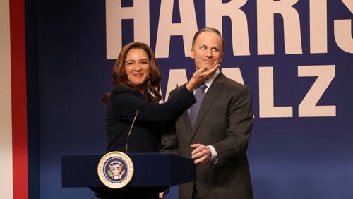 This image released by NBC shows Maya Rudolph as Kamala Harris, left, and Andy Samberg as Douglas Emhoff, during the cold open sketch on "Saturday Night Live" in New York on Saturday, Sept. 28, 2024. (Will Heath/NBC via AP)