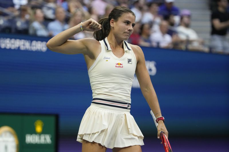 Emma Navarro, of the United States, reacts after defeating Coco Gauff, of the United States, during the fourth round of the U.S. Open tennis championships, Sunday, Sept. 1, in New York. 2024. (AP Photo/Pamela Smith)