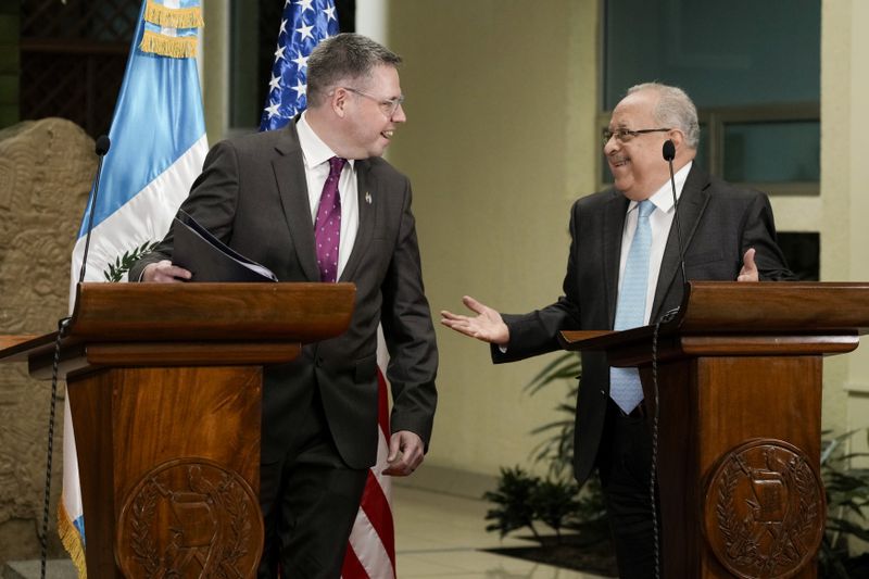 U.S. Deputy Assistant Secretary of State for Western Hemisphere Affairs Eric Jacobstein, left, and Guatemalan Foreign Minister Carlos Martinez, arrive to a press conference regarding the release of 135 Nicaraguan political prisoners, in Guatemala City, Thursday, Sept. 5, 2024. The U.S. government announced it secured the release of the political prisoners, who have arrived in Guatemala where they will apply for entry to the United States or other countries. (AP Photo/Moises Castillo)