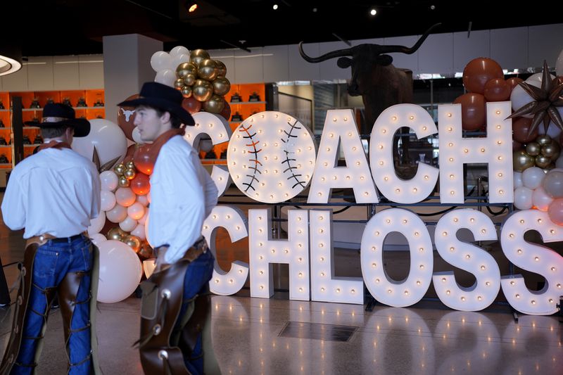 A lighted sign awaits Jim Schlossnagle before he is introduced as the new NCAA college head baseball coach at Texas, Wednesday, June 26, 2024, in Austin, Texas. Schlossnagle left rival program Texas A&M. (AP Photo/Eric Gay)