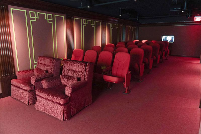 The replica of the White House movie theater room, shown at The People's House exhibit, Monday, Sept. 16, 2024 in Washington. (AP Photo/Jose Luis Magana)