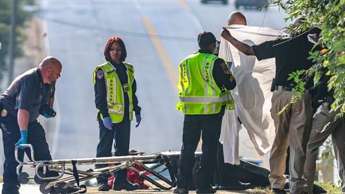 A woman was found dead in a wooded area of DeKalb County on Monday, officials said.