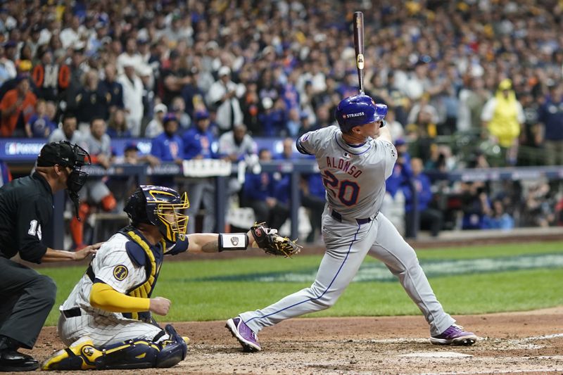 New York Mets' Pete Alonso hits a three-run home run during the ninth inning of Game 3 of a National League wild card baseball game against the Milwaukee Brewers Thursday, Oct. 3, 2024, in Milwaukee. (AP Photo/Morry Gash)