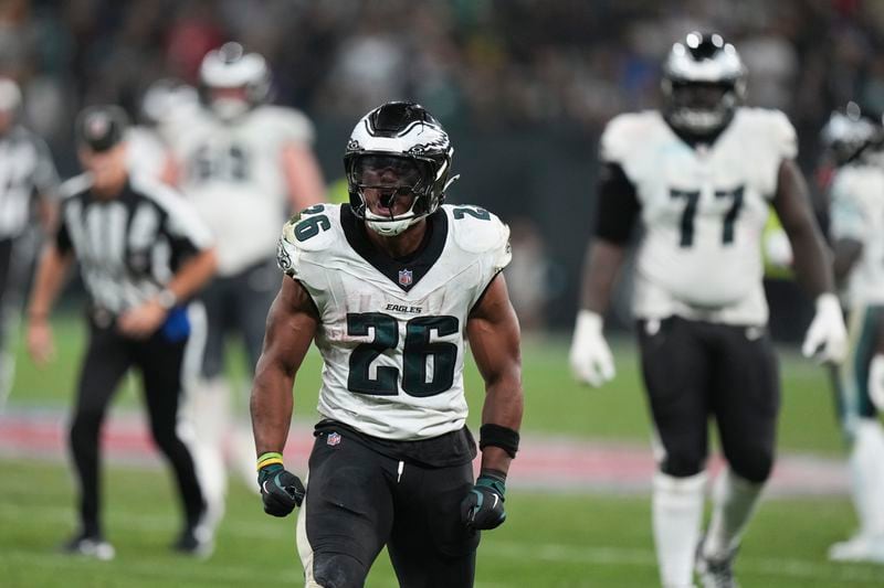 Philadelphia Eagles running back Saquon Barkley (26) reacts during the second half of an NFL football game against the Green Bay Packers, Friday, Sept. 6, 2024, at the Neo Quimica Arena in Sao Paulo. (AP Photo/Fernando Llano)