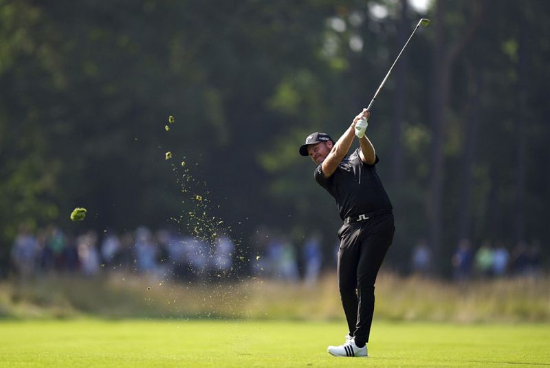 Danny Willett in action during the day one of the BMW PGA Championship at Wentworth Golf Club in Virginia Water, Surrey, England, Thursday, September 19, 2024. (Zac Goodwin/PA via AP)