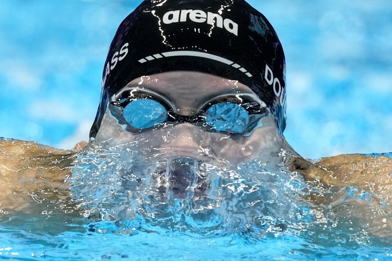 Kate Douglass swins during the Women's 200 individual medley finals Saturday, June 22, 2024, at the US Swimming Olympic Trials in Indianapolis. (AP Photo/Michael Conroy)