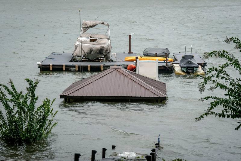 A gazebo and the stairs that lead to it are flooded and under water after Hurricane Helene passed the area on Lake James, Friday, Sept. 27, 2024 in Morganton, N.C. (AP Photo/Kathy Kmonicek)