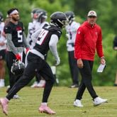 Atlanta Falcons offensive coordinator Zac Robinson, right, watches as wide receiver Chris Blair goes through a drill during minicamp at the Atlanta Falcons Training Camp, Tuesday, May 14, 2024, in Flowery Branch, Ga. (Jason Getz / AJC)
